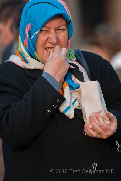 20100403_181929 D300 (1).jpg - Lady eating chestnuts